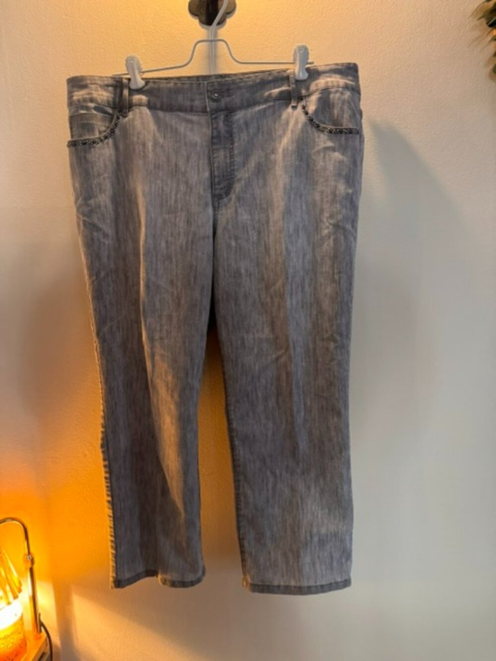 Chico's Platinum Denim gray jeans featuring sequin embellishments on the front